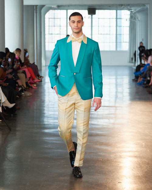 Sleek turquoise and yellow tuxedo blazer with yellow shimmery trousers