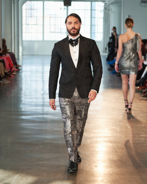 Exquisite black textured designed tuxedo jacket with shimmery silver and gray trousers. A true masterpiece!!!