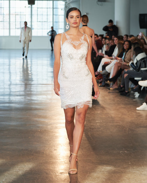 Elegant white sequin and beaded cocktail dress