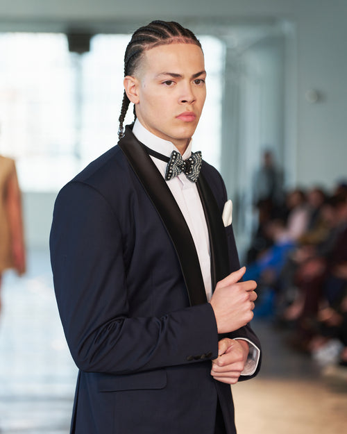 Classy dark blue tuxedo with hand beaded bowtie